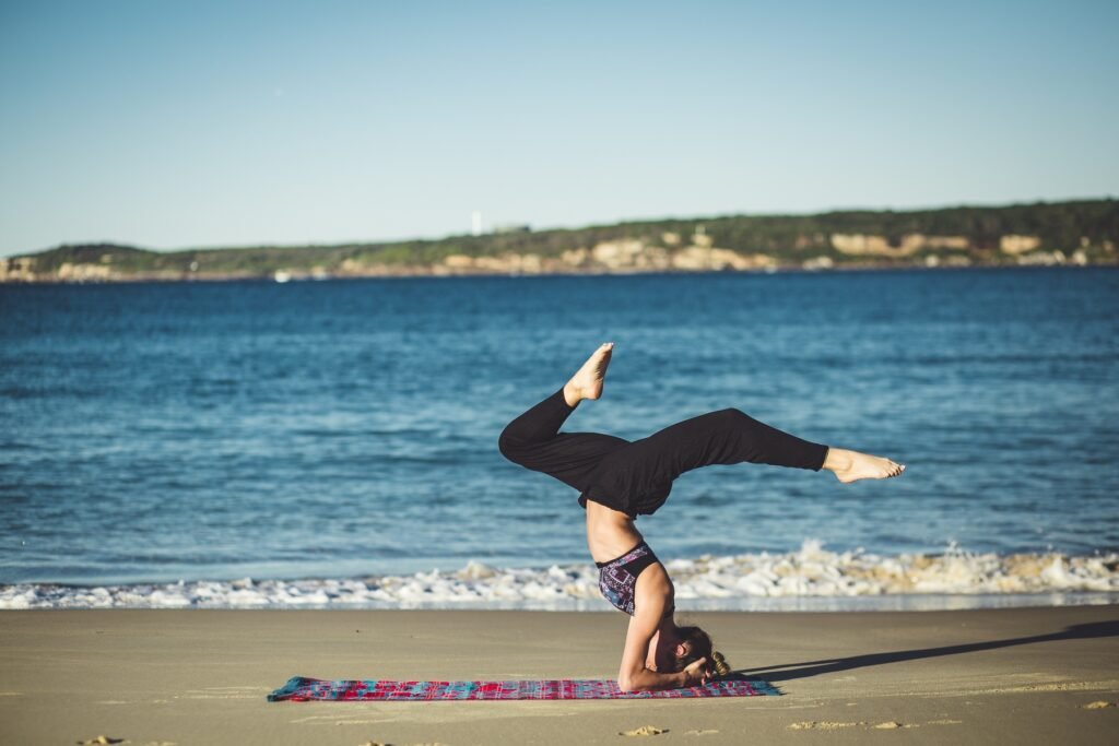 Is Vegan Protein Powder Bad for Your Stomach? 1 beach sea sand ocean person sitting 49370 pxhere.com